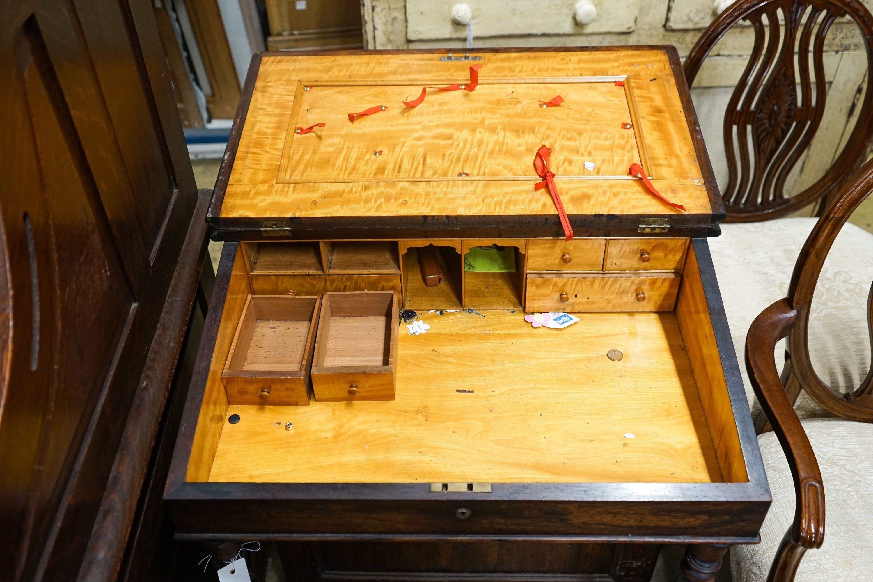 An early Victorian rosewood davenport, width 66cm, depth 56cm, height 72cm